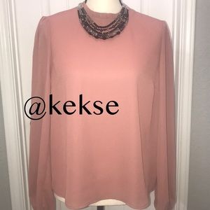 Rose colored blouse